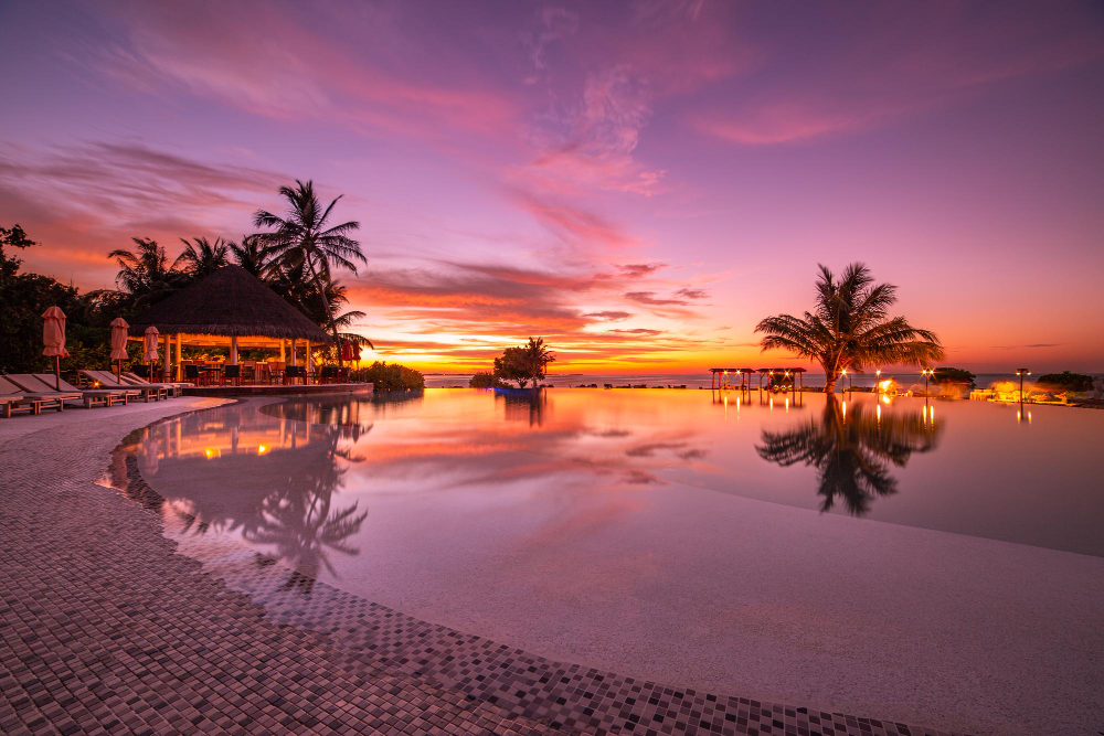perfect-beach-sunset-relaxation-pool-luxurious-beachfront-hotel-resort-sunset-light-perfect